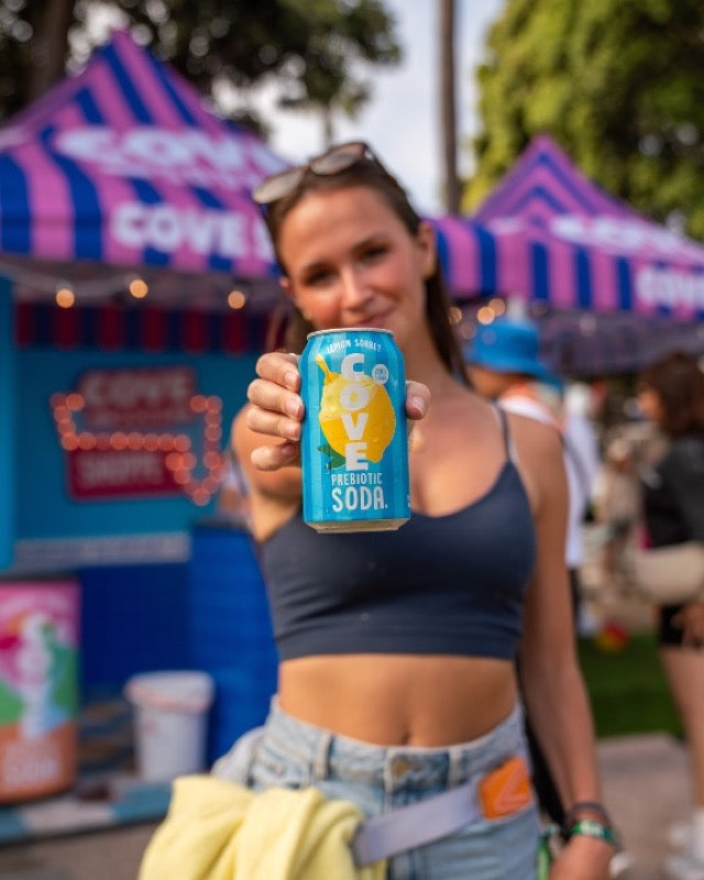 A fan with Lemon Sorbet at a Cove booth