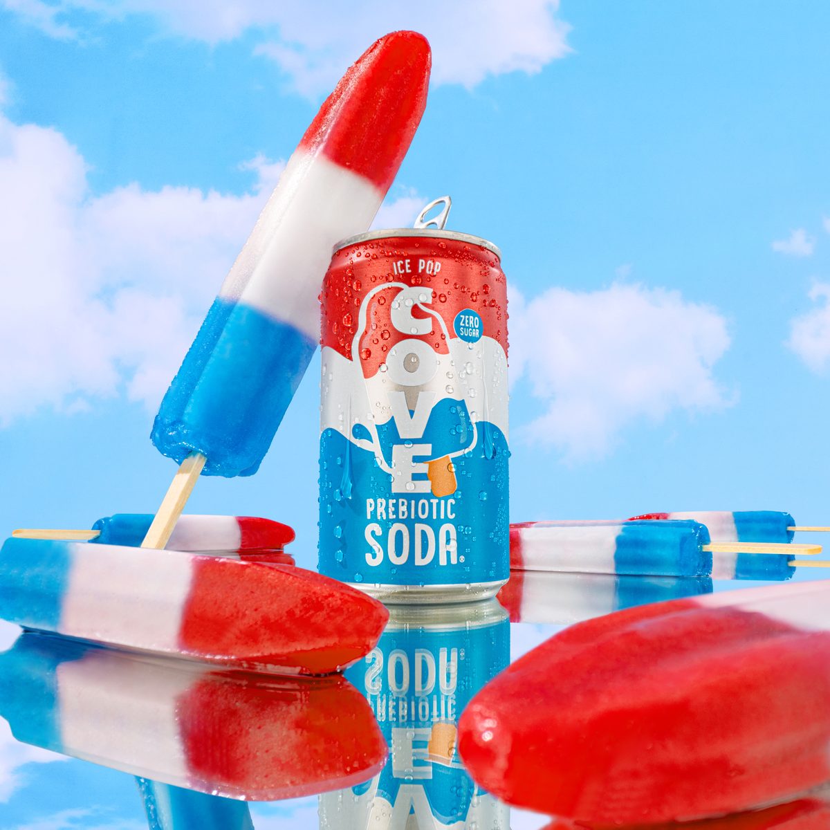Cove Ice Pop can with red-white-and-blue rocket popsicles against a bright blue sky